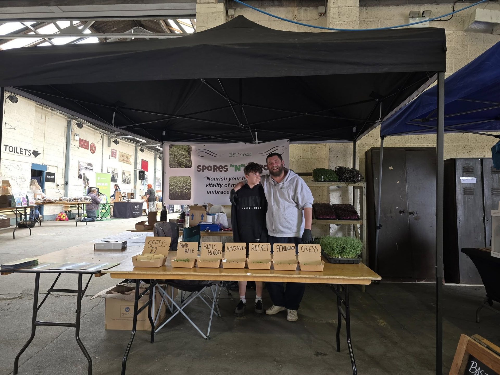 two man selling products